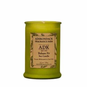 Balsam Fir Candle in a green glass jar with an ADK Label. 4.5oz