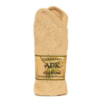 Loomed organic washcloth with ADK Fragrance Farm label sleeve
