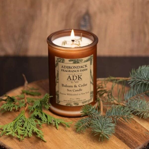 Balsam Cedar Candle with ADK label 10oz Lifestyle background