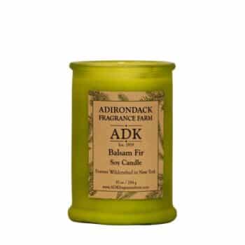 Balsam Fir Candle in a green glass jar with an ADK Label. 10oz