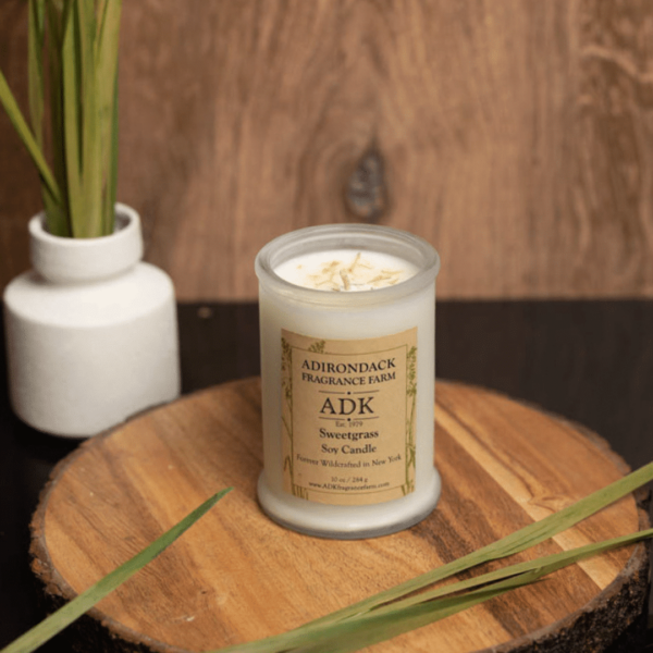 White candle on a wooden background